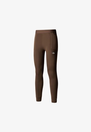 Leggings de sport marron en tissu extensible. Dotés d'une taille haute, de poches latérales et d'un petit logo sur le bas de la jambe.