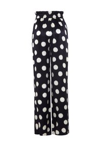 Zwarte wijde broek van gladde stof met grote witte stippen, voorzien van een elastische tailleband en een relaxte pasvorm.