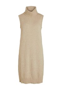 Beige stickad ärmlös klänning med hög ribbad polokrage. Har en rak silhuett och ribbad nederdel. Mjuk textur.