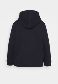 Tmavě modrá mikina s kapucí, dlouhými rukávy, žebrovaným lemem a manžetami. Hladká textura s prošitými detaily na švech.