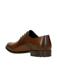 Scarpa da dress in pelle marrone con superficie liscia, punta arrotondata, design con lacci, cuciture in contrasto e tacco basso impilato.