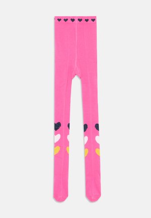 Lys pink børnetights med mønstre af sorte, hvide og gule hjerter nær anklerne og en række sorte hjerter ved taljen.