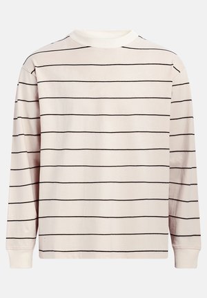 Camicia in cotone a maniche lunghe con base color crema e righe nere orizzontali, scollo rotondo e polsini a coste.