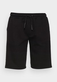 Pantaloni corti neri in tessuto morbido, con vita elastica e cordoncino, e tasche laterali. Superficie liscia e taglio all'altezza del ginocchio.