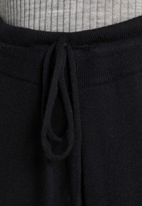 LASCANA CUDDLE - Jogginghose - schwarz