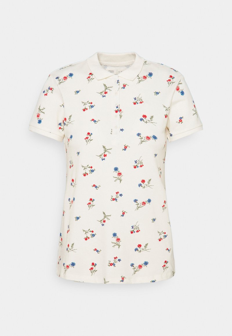 Polo blanc à manches courtes avec un petit imprimé floral rouge, bleu et rose dispersé uniformément sur le tissu.