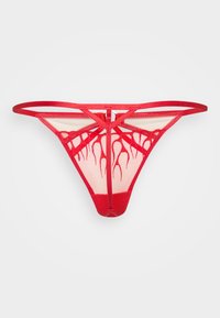 Tanga vermelha transparente com padrão decorativo de chamas na frente, apresentando tiras finas e uma camada de base sutil contrastante.