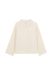 Chemise légère de couleur crème avec une patte de boutonnage sur le devant, un col large et des manches longues. Présente un tissu texturé avec des rayures verticales subtiles.