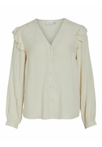 Lyscremebluse med v-hals, knaplukning og flæsedetaljer ved skuldrene. Lange ærmer med samlede manchetter. Glat tekstur.