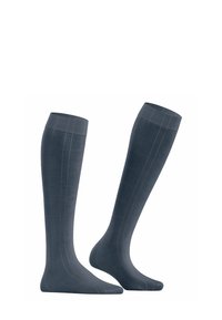 Kompressionskniestrümpfe in dunkelblau mit subtilen kontrastierenden Karomuster. Hergestellt aus glattem, dehnbarem Material für Komfort.