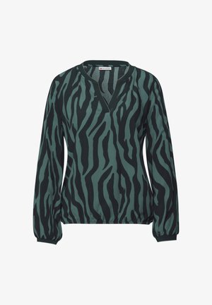 Langsleeve top in donkergroen met zwarte zebra-strepen, heeft een V-hals en een elastische zoom voor een relaxte pasvorm. Glad stoftextuur.