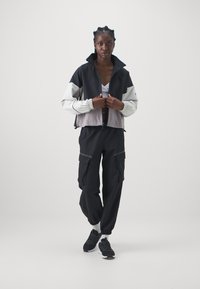 Under Armour UNSTOPPABLE - Trousers - black