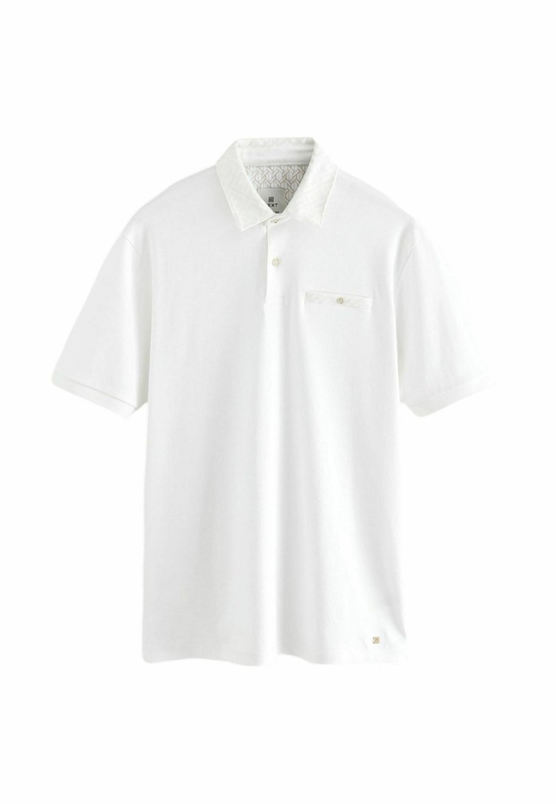Weißes Poloshirt aus Baumwolle mit gemustertem Kragen. Verfügt über eine Knopfleiste und eine kleine Brusttasche mit einem Knopfdetail.