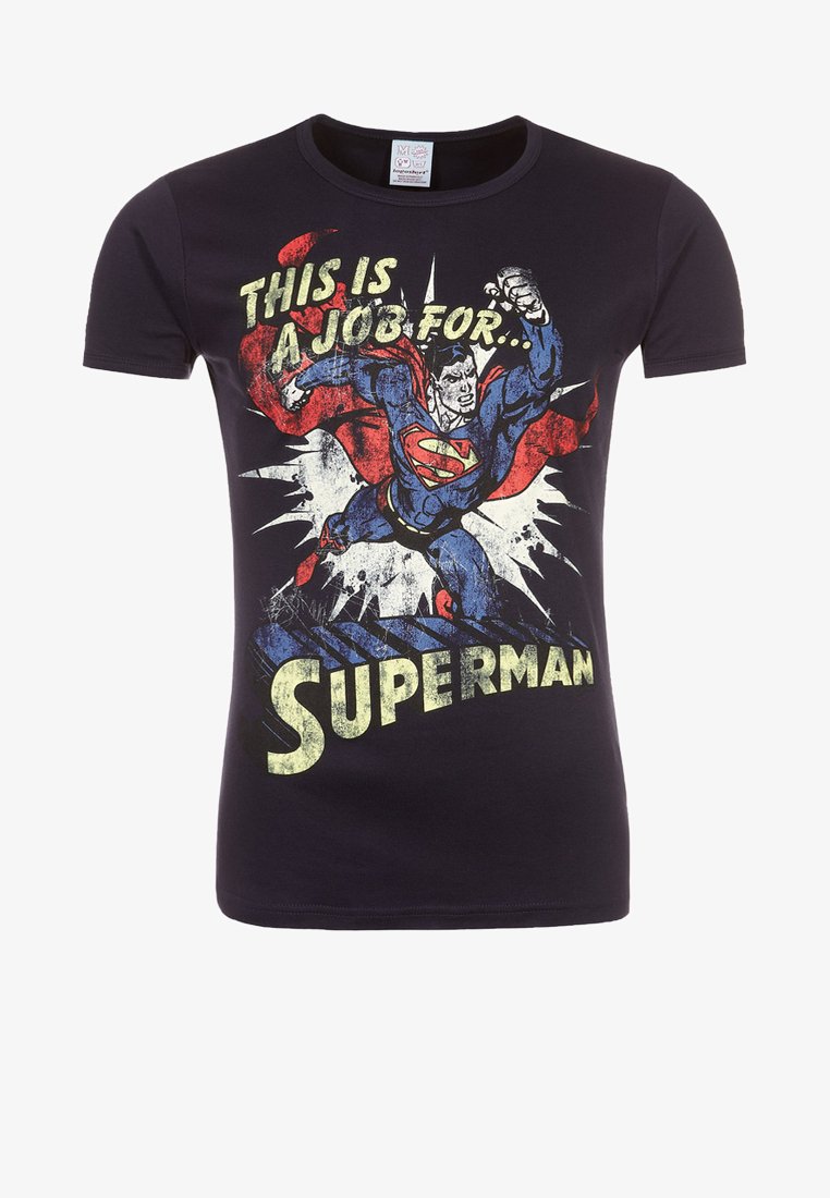Black t-shirt with vintage-style Superman flying graphic and text "This is a job for... Superman" in bold yellow letters.