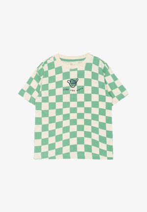 T-shirt à manches courtes à carreaux verts et blancs avec un col arrondi et un texte graphique « ride the wave » accompagné d'un motif de geste de la main.