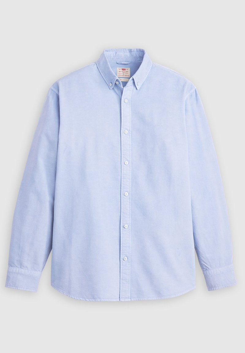 Light blue long-sleeve button-up shirt made of cotton, featuring a classic collar and subtle branded embroidery on the left chest.