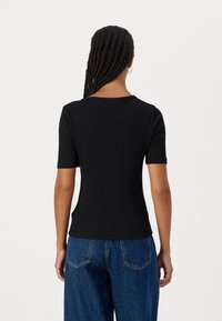 Calvin Klein Jeans V NECK TEE - Camiseta básica - black
