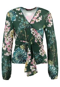 Grön blommig omslagsblus med långa ärmar, prydd med rosa, blåa och gula blommönster, i ett mjukt tyg och med en knutdetalj vid midjan.