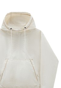 Vit hoodie med dragkedja, stor framficka, och kontrasterande beige sömmar. Texturerad tyg med avslappnad passform.