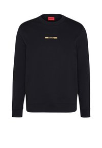 Felpa nera in cotone, con maniche lunghe, colletto a girocollo e un logo dorato sulla parte anteriore. Texture liscia e colore uniforme.