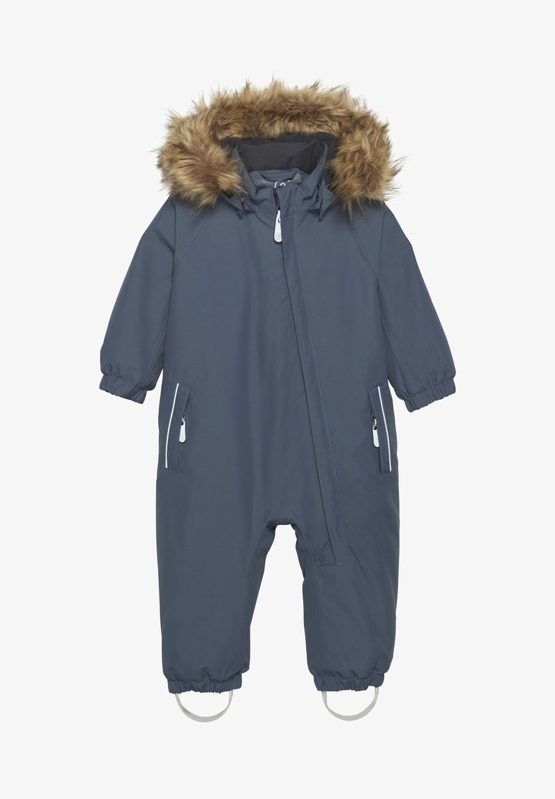 Navyblå isolerad snoverall med huva kantad av fuskpäls, elastiska mudd, två framfickor med dragkedja och fotremmar. Vattentåligt material.