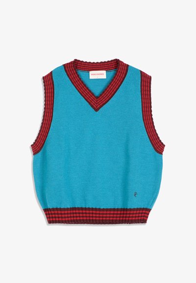 Gilet bleu en maille sans manches avec bordure rayée rouge et rouge foncé au niveau de l'encolure, des emmanchures et de l'ourlet, et un petit logo brodé près de l'ourlet.