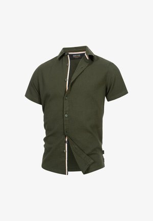 Kortermet skjorte i mørkegrønn teksturert stoff. Har knapplukking foran og kontrasterende innvendig kant i oransje og marineblå.