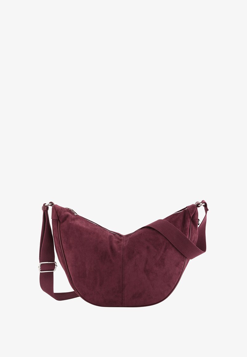 Burgundowa skórzana torebka na ramię o zaokrąglonym kształcie, z regulowanym paskiem i zamkiem błyskawicznym. Miękka tekstura i gładkie wykończenie.
