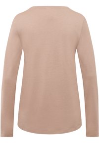 Langarmshirt in lichtbeige, gemaakt van zacht materiaal. Heeft een ronde halslijn en een gladde textuur zonder zichtbare patronen of hardware.