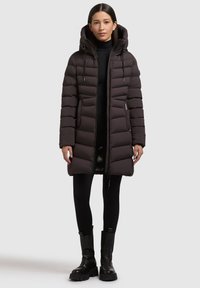 Black puffer coat with a hood, featuring a quilted design, zip closure, two side pockets, and drawstring accents for adjustment.