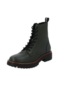 Stivaletto in pelle verde con lacci neri, punta rotonda e cuciture a contrasto marroni. Suola spessa e robusta con dettagli antiscivolo e linguetta sul retro.