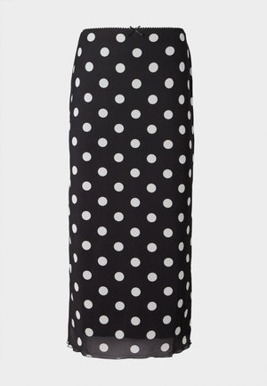 Musthave mustrõngastega must midi seelik, mis on valmistatud kerge kangaga ja millel on valged ringjad mustrid, sobiva vöökoht ja peene laineline äär.