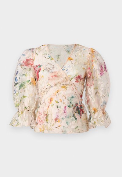 Blouse à motif floral en tissu léger et transparent. Elle présente un design portefeuille, un décolleté en V profond, des manches bouffantes et des poignets volantés dans des couleurs pastel.