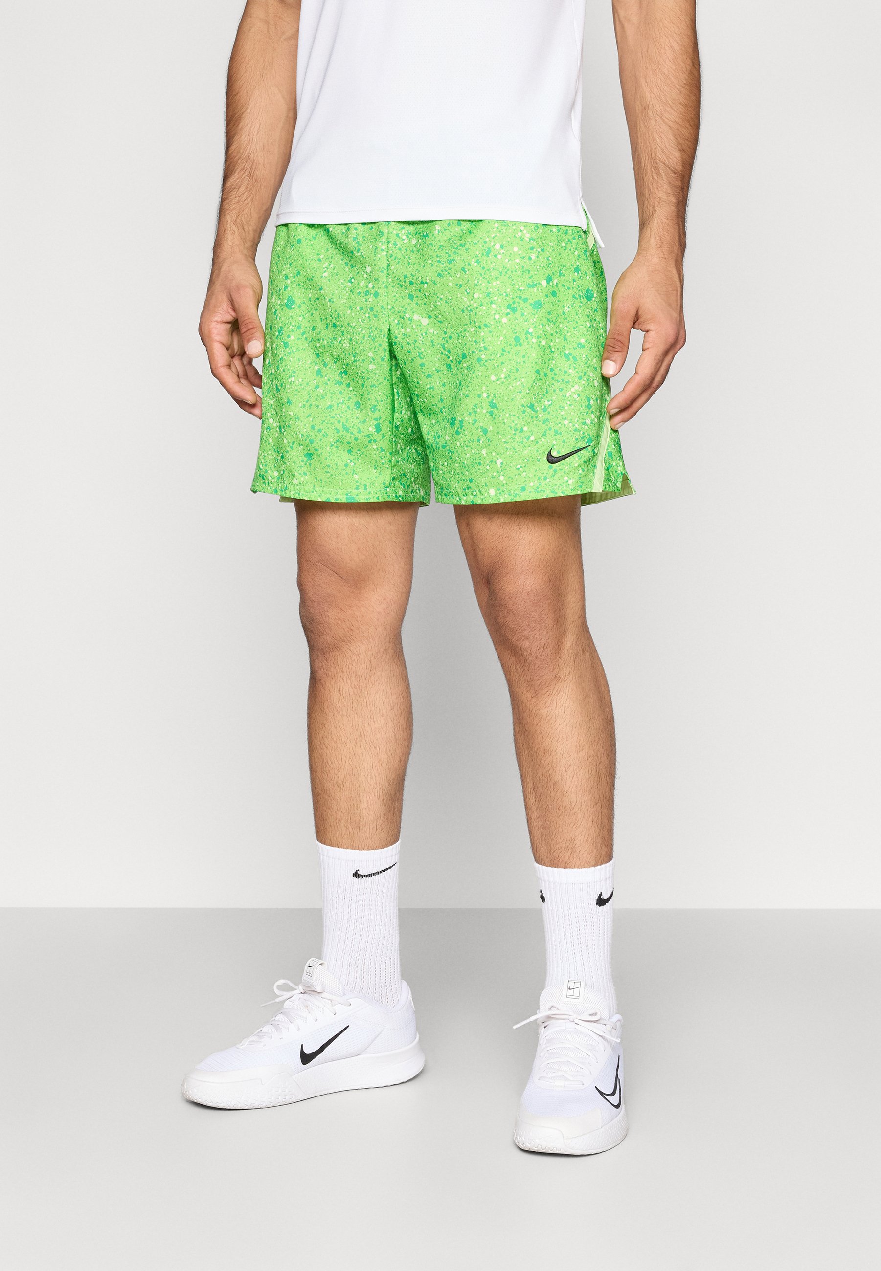 lime green and black nike shorts