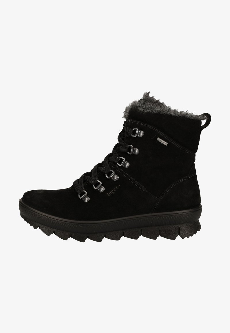 Bottines en daim noir avec un revers en fourrure texturée, dotées d'œillets métalliques et de lacets, ainsi que d'une semelle en caoutchouc épaisse et robuste pour une meilleure stabilité.