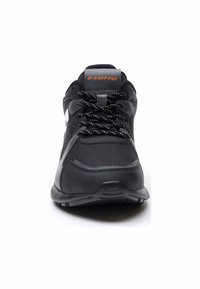 Black athletic shoe with fabric and synthetic upper, textured toe, sturdy sole, and contrasting gray and orange accents on the branding.