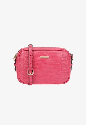 Pink textured crossbody bag with adjustable strap, gold zipper, and rectangular metal logo plaque on the front.