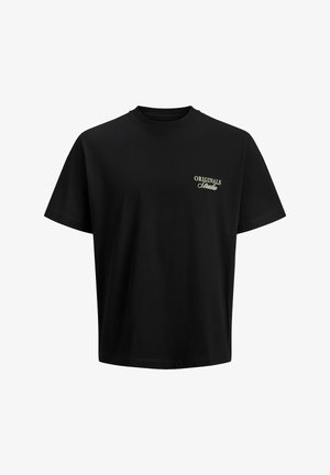 Svart bomulls-T-skjorte med korte ermer, rund hals og en liten grønn brodert "ORIGINALS Studio"-logo på brystet. Avslappet passform.