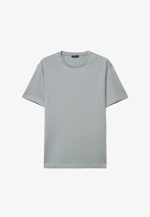T-shirt grigio chiaro a maniche corte con scollo tondo e orlo dritto, mostrata su sfondo bianco.