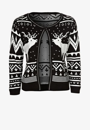 Black and white knit cardigan featuring reindeer, geometric patterns, and stripes. Open front with ribbed cuffs and hem. Soft texture.