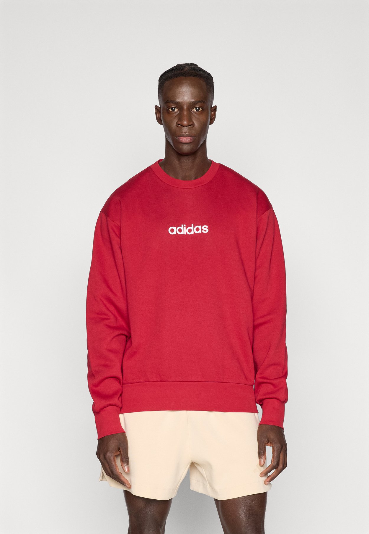ESSENTIALS LINEAR FLEECE