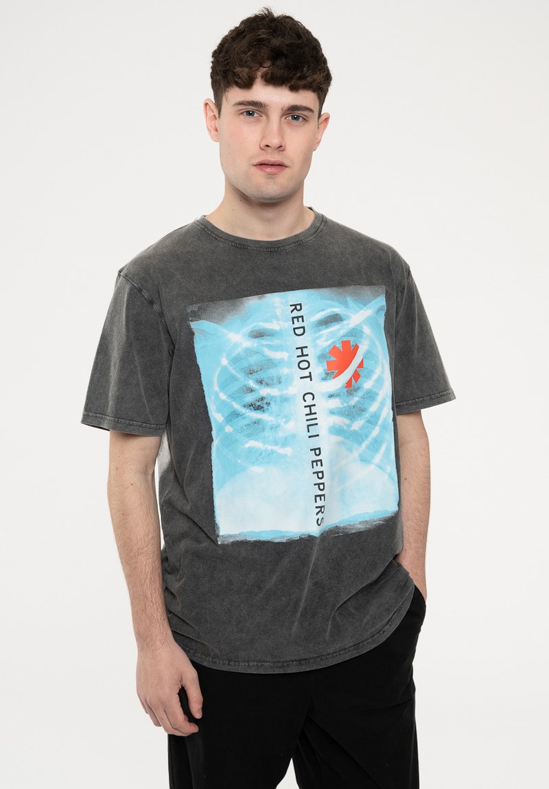 Gray cotton t-shirt featuring a prominent blue graphic with a skeleton design and the text "RED HOT CHILI PEPPERS" in black.