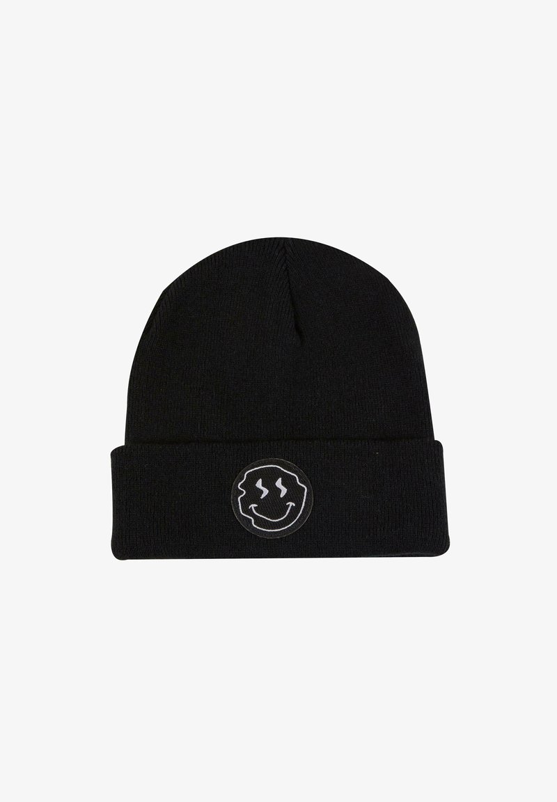 Căciulă tricotată neagră, cu un design pliabil, având o petică albă circulară pe care se află un grafic cu o față zâmbitoare și linii ondulate.