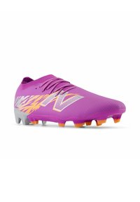 Purple soccer cleats with a textured surface, featuring a gradient design in orange and white accents, and a raised sole with orange studs.