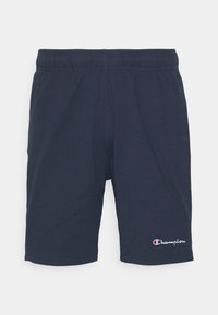 Námořnické modré sportovní kraťasy s elastickým pasem a vyšívaným logem "Champion" na levé nohavici. Hladká textilie.