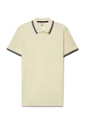 Polo beige a maniche corte con doppie strisce nere su colletto e polsini, abbottonatura a due bottoni, etichettato taglia XL.