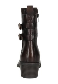 Braune Leder-Ankle-Boots mit mattem Finish, ausgestattet mit drei verstellbaren Riemen und einem niedrigen, gestapelten Absatz. Reißverschluss an der Seite.
