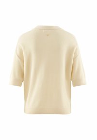 Pull en tricot à manches courtes de couleur beige clair, avec un motif texturé, un col classique et un ourlet et des poignets côtelés.