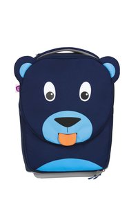 Blauer, bärenförmiger Rucksack aus marineblauem Stoff, mit großen Cartoon-Augen, einer orangefarbenen Zunge und blauen Akzenten. Obere Reißverschlussöffnung, gepolsterter Rücken.
