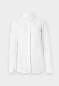 Chemise blanche à manches longues en coton lisse. Présente un col classique et un devant à boutons avec un ourlet droit et sans motifs.